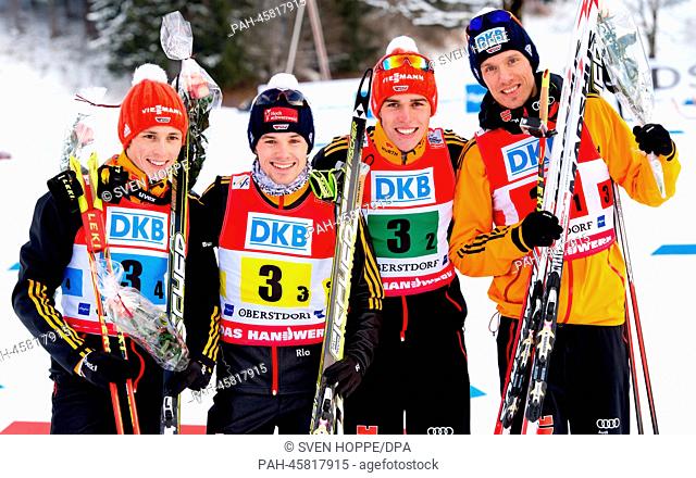 Team Germany Eric Frenzel (L-R), Fabian Riessle, Johannes Rydzek und Tino Edelmann cheer after the team competition at the nordic combined skiing world cup in...