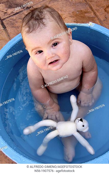 Baby having a Summer bath