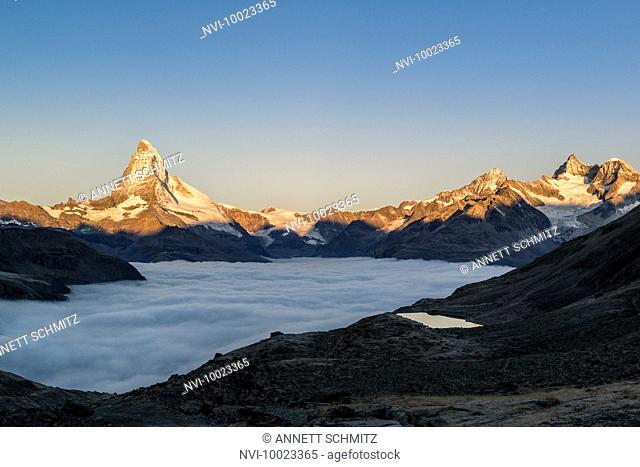 Matterhorn with clouds at sunrise, Switzerland