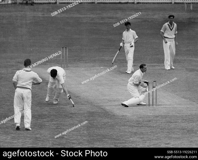 English Wicketkeeper Arthur McIntyre whips the bails off smartly to run R. Strauss (Colts) out in the match at Perth. Compton is at leg and bowler J