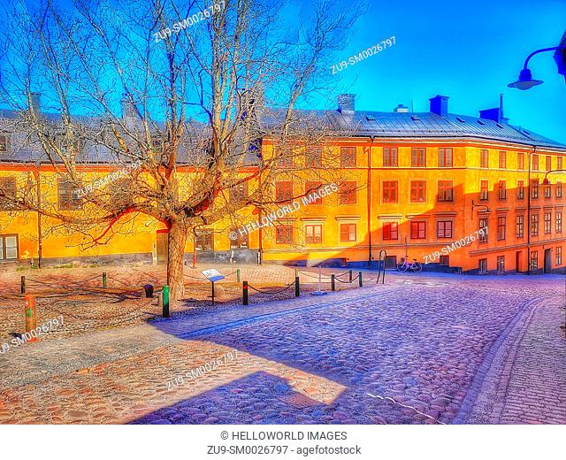 Small triangular cobbled square where Bastugatan meets Pryssgrand, Sodermalm, Stockholm, Sweden, Scandinavia. Well preserved 18th century houses