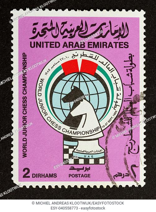 UNITED ARAB EMIRATES - CIRCA 1980: Stamp printed in the UAE shows two chesspieces, circa 1980