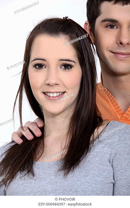 Young woman standing next to her boyfriend