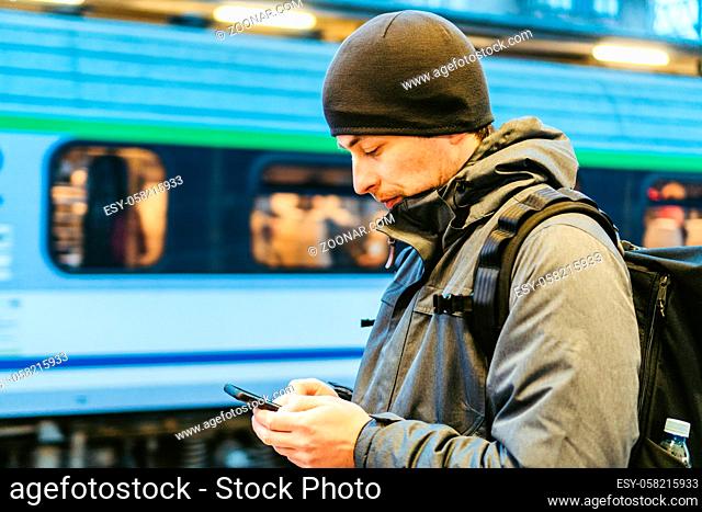 Sopot Railway station. traveler waiting for transportation. Travel concept. Man at the train station. Portrait Of Caucasian Male In Railway Train Station