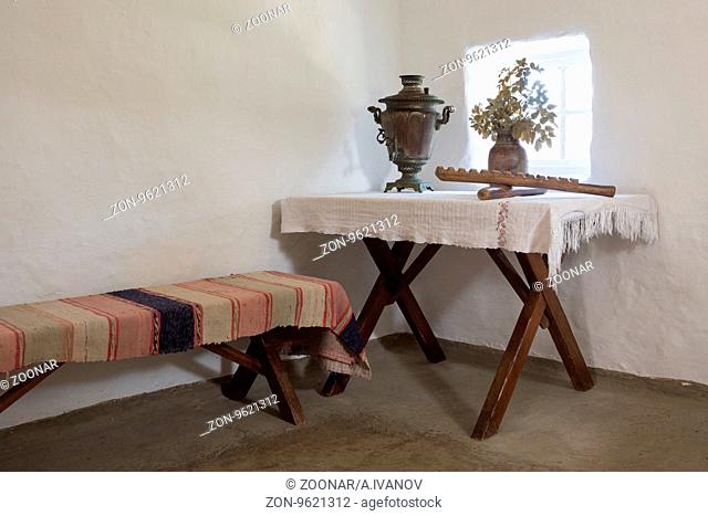 Taman, Russia - March 8, 2016: View on the bench - bed in the cottage in a museum in memory of the great Russian poet of stay MY Lermontov's Taman in September...