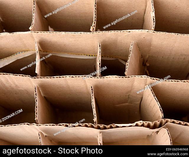 brown corrugated paper cardboard box with partitions, glass bottle transport box, close up