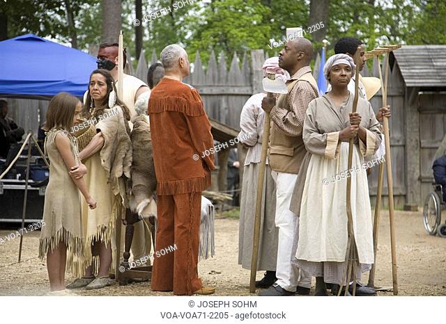 Native Americans and African slave reenactors posing as part of the 400th anniversary of the Jamestown Colony, Virginia, attended by Her Majesty Queen Elizabeth...