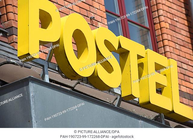 10 July 2019, Mecklenburg-Western Pomerania, Wolgast: View of the lettering ""Postel"" at the former imperial post office of the city of Wolgast