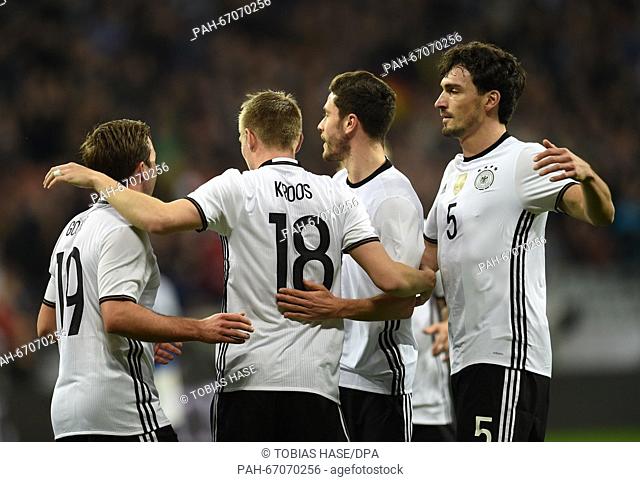 Germany's Toni Kroos (C) celebrates his 1-0 goal with Mario Goetze (L), Mats Hummels (R) and Jonas Hector during the international soccer match between Germany...