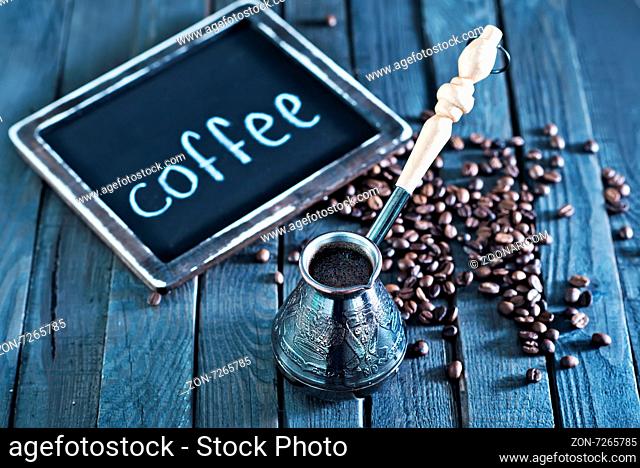 coffee beans on the wooden table, coffee background