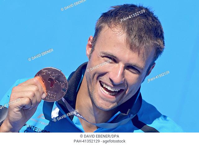 Sascha Klein of Germany in action during the men's 10m Platform diving final of the 15th FINA Swimming World Championships at Montjuic Municipal Pool in...