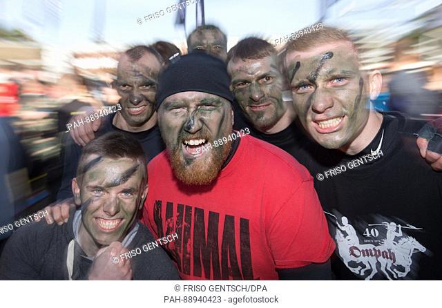 Participants in the Strong Viking Run obstacle course race in action in Fuerstenau, Germany, 11 March 2017. The participants msut complete race over numerous...