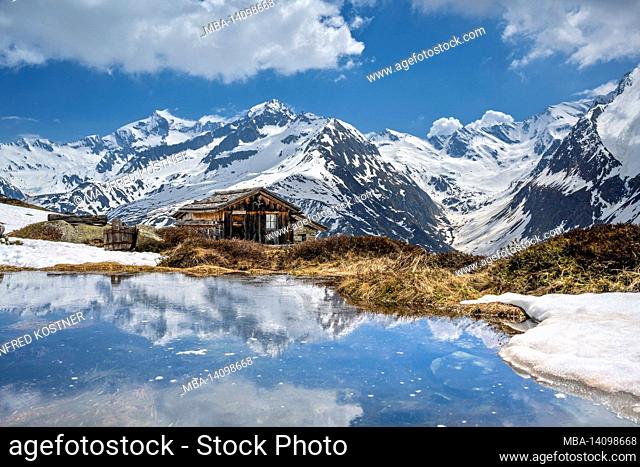 prettau, ahrntal, bolzano province, south tyrol, italy. seppels hut in front of the mighty dreiherrnspitze