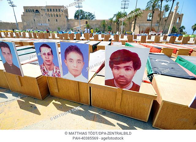 Symbolic coffins with images of dead revolutionaries are pictured in the city center of Tripoli, Libya, 7 June 2013. Commemorating the martyrs of the Libyan...