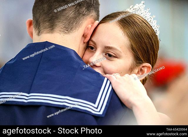 RUSSIA, SEVASTOPOL - DECEMBER 2, 2023: A couple dances during a ball held by the Yunarmiya [Young Army] Military Patriotic Movement at the Catherine Hall of the...