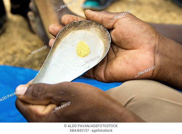 Gold dust, gold mine, Narena area, Mali