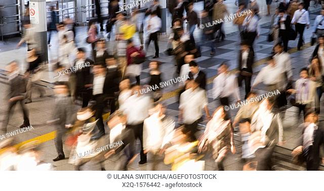 Commuters at a Tokyo rail way station, Japan