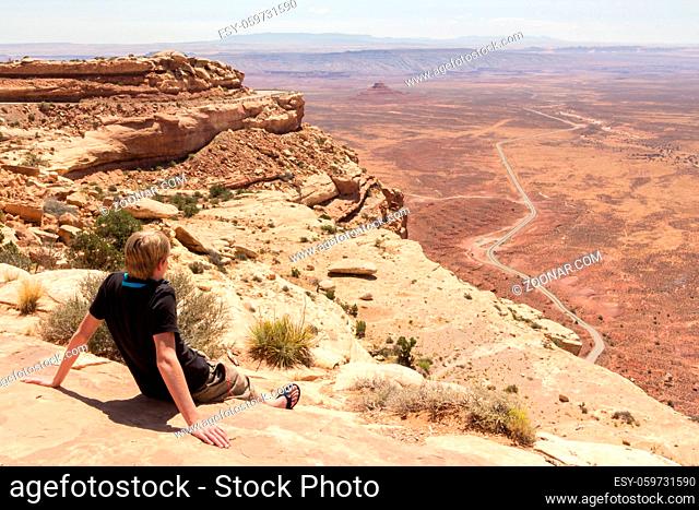 Youngster enjoying the view of the deserts of Monument valley in Arizona Utah in USA