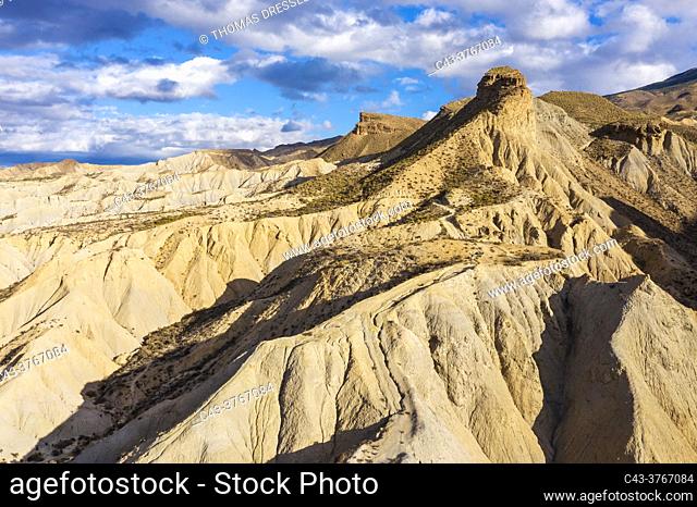 Bare ridges of eroded sandstone in the Tabernas Desert, Europe's only true desert. Aerial view. Drone shot. Almeria province, Andalusia, Spain