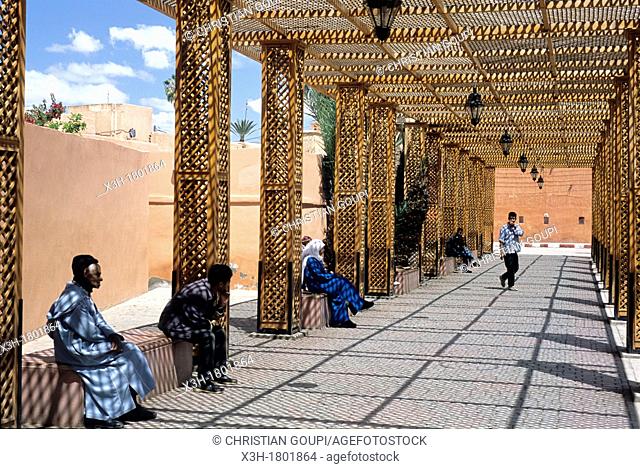 walkers under a pergola in the Mellah area, Marrakech, Atlas, Morocco, North Africa