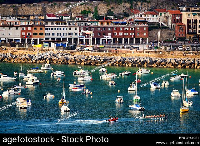 Rowers in the Bay of La Concha, behind the Port, Donostia, San Sebastian, cosmopolitan city of 187, 000 inhabitants, noted for its gastronomy
