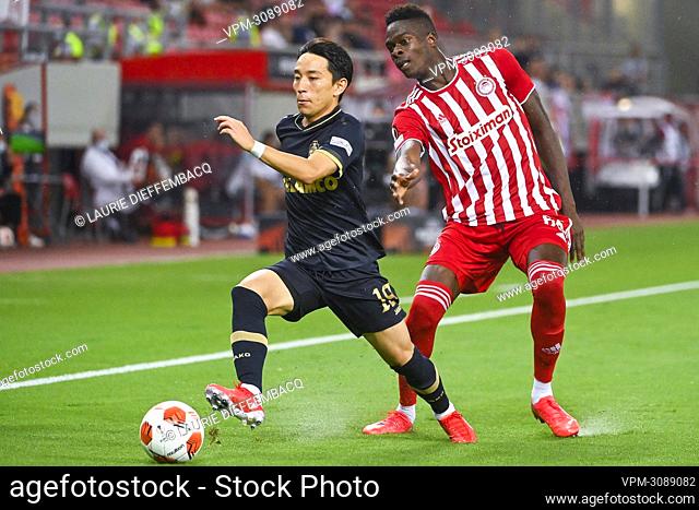 Antwerp's Koji Miyoshi and Olympiacos' Pape Abou Cisse fight for the ball during a soccer game between Greek Olympiacos F.C