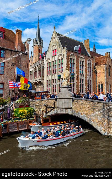 Brugge, Belgium - April 30, 2017: Tourists in old town Brugge