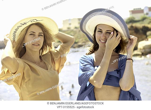 Two women by the sea, Crete, Greece