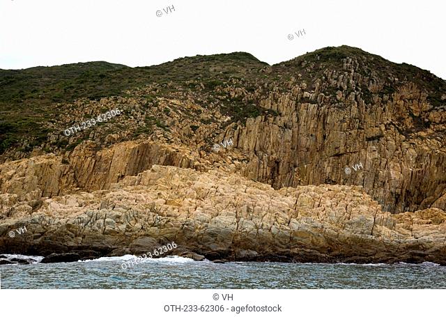 Wave erosion rocks at the coast of Jin Island (Tiu Chung Chau), off Sai Kung, Hong Kong
