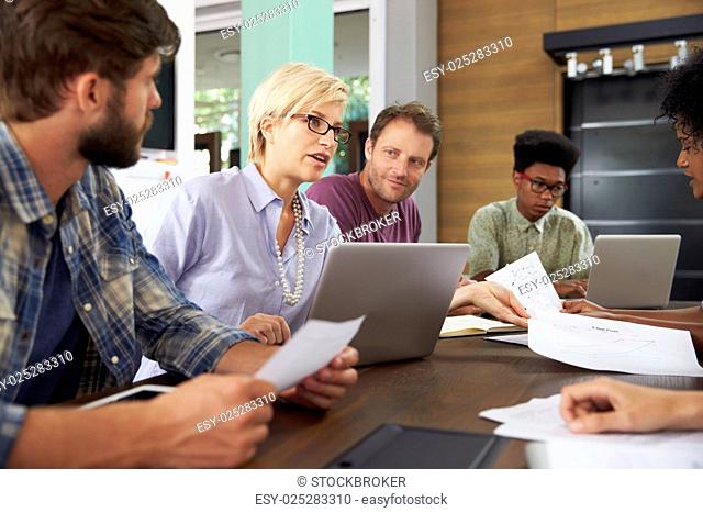 Female Manager Leading Meeting In Office