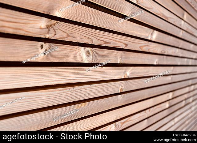 Close up of Wood paneling background texture. Modern ecological wooden facade thermal insulation