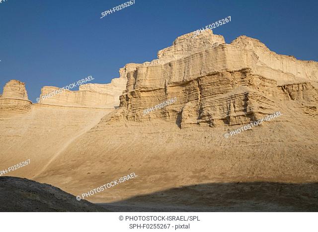 Marl stone formations. Eroded cliffs made of marl, a calcium carbonate-rich, mudstone formed from sedimentary deposits. Photographed in the Dead Sea region of...