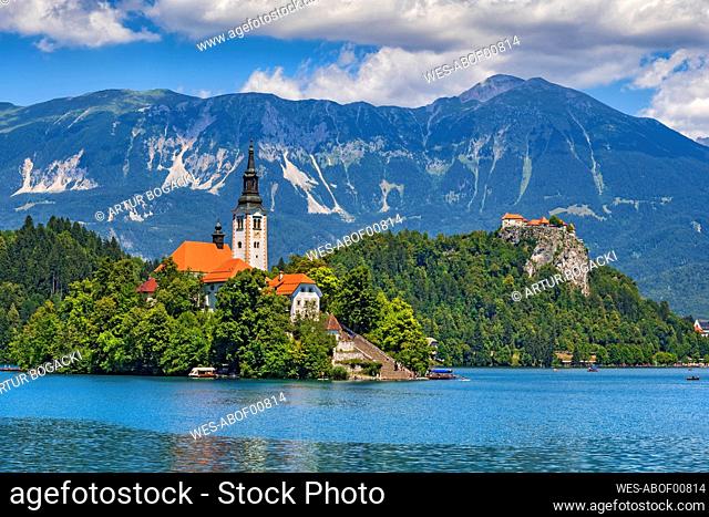 Slovenia, Upper Carniola, Church, Scenic view of church on Bled Island with Julian Alps in background