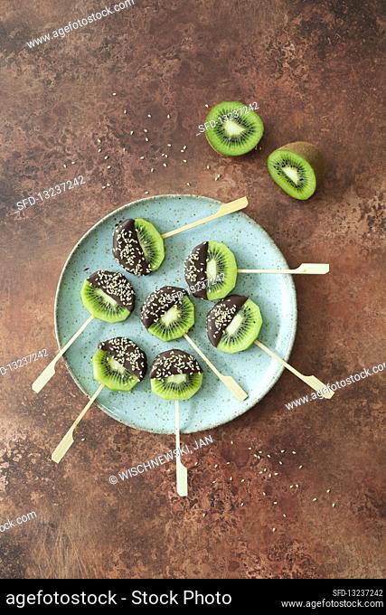 Kiwi on a stick dipped in chocolate