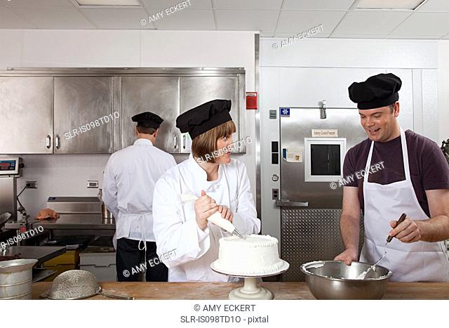 Making cake in commercial kitchen