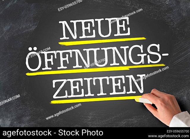 text NEUE OFFNUNGSZEITEN, German for new opening hours or changed business hours, written on blackboard