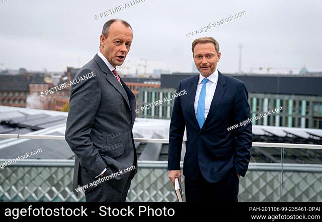 06 November 2020, Berlin: Friedrich Merz (l), candidate for the CDU party chairmanship, and Christian Lindner, parliamentary party leader in the Bundestag and...