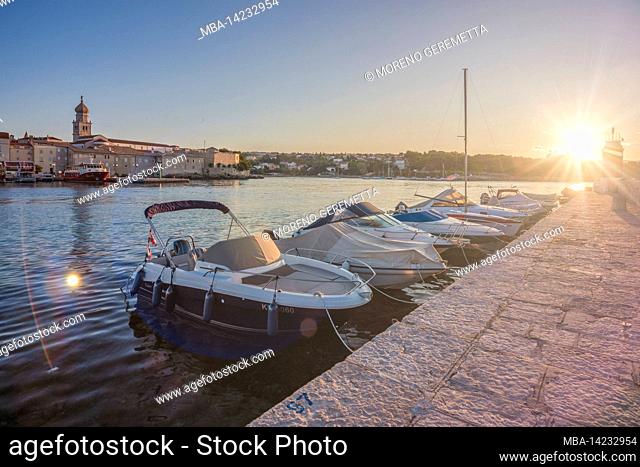 Croatia, Kvarner bay, Island of Krk, view of marina and old town of Krk in the morning