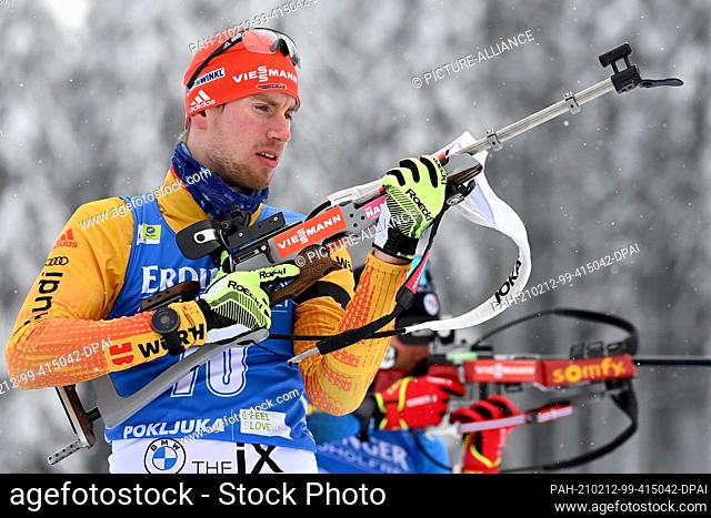 12 February 2021, Slovenia, Pokljuka: Biathlon: World Cup/ World Championship, Sprint 10 km, Men. Johannes Kühn from Germany in action during the shooting