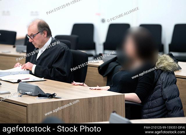 25 January 2021, Saxony, Dresden: Joachim Keiler (AfD), lawyer and member of the state parliament, sits next to a defendant in the hearing room of the Higher...