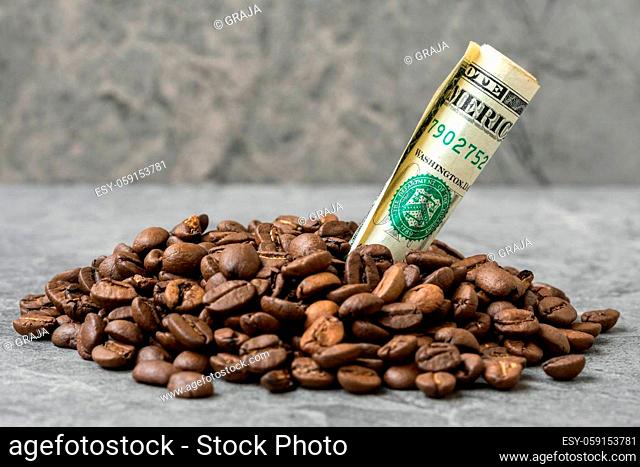 USA coffee market. Roasted coffee beans and USD currency