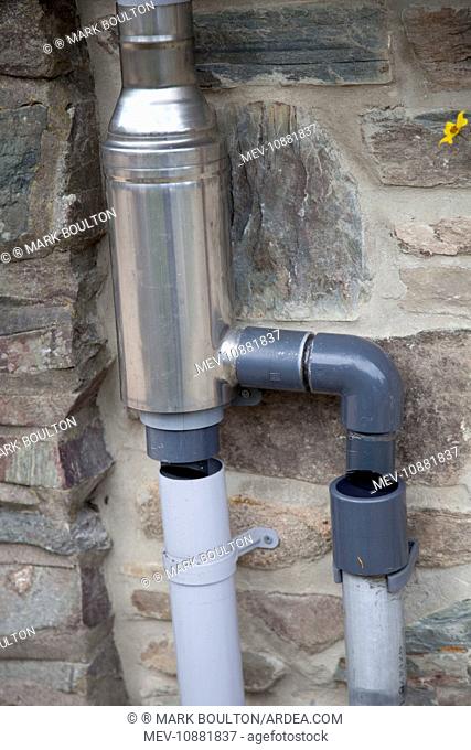 Wisey stainless steel rain water diverter and filter installed in downpipe of eco house