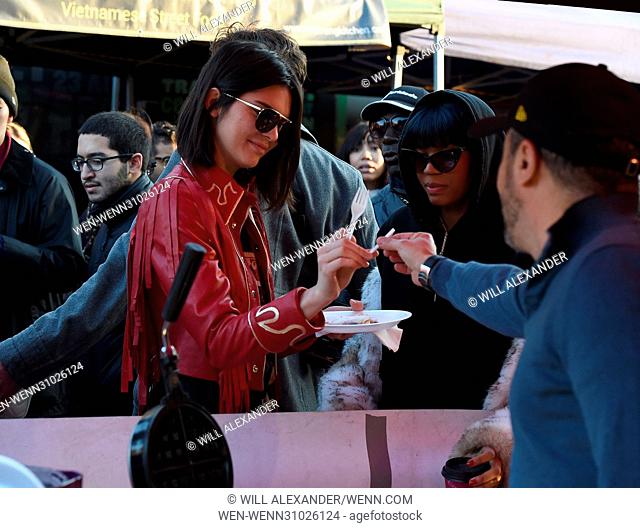 Kendall Jenner enjoys an afternoon shopping in the famous Portobello Road Market in Notting Hill. The star blended in to the huge crowds