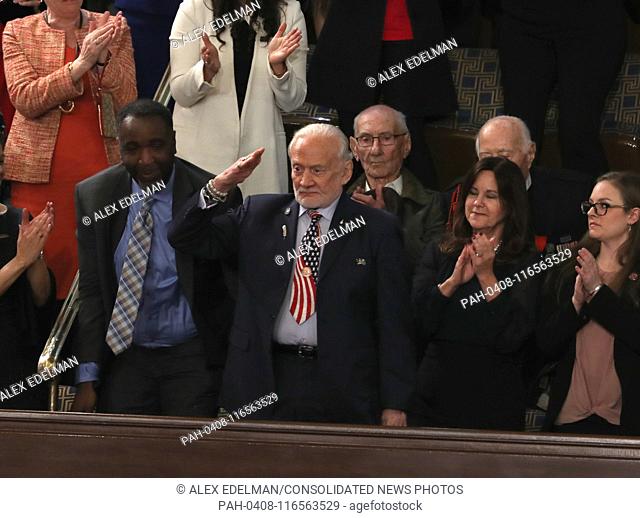 Former astronaut Buzz Aldrin salutes after being recognized as United States President Donald J. Trump delivers his second annual State of the Union Address to...
