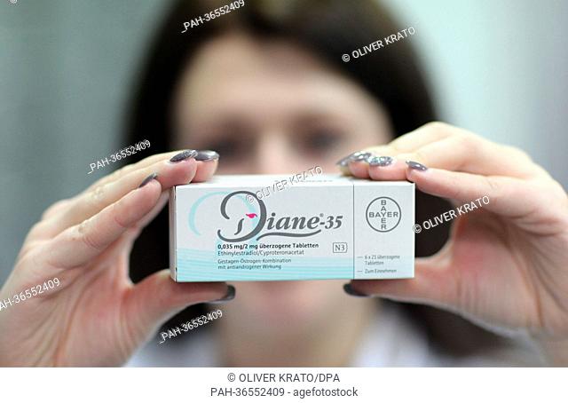 A pharmaceutical assistant holds a pack of the contraceptive Diane 35 in Luebbecke, Germany, 30 January 2013. The acne medicine by Bayer often prescribed as a...