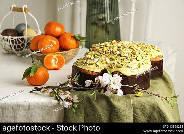 Colomba di Pasqua - traditional italian easter dove cake with green pistachio glaze