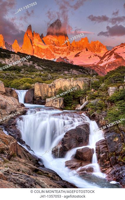 FitzRoy waterfall at dawn under famous rock peak Cerro FitzRoy  El Chalten , Parque Nacional Los Glaciares, Patagonia, Argentina