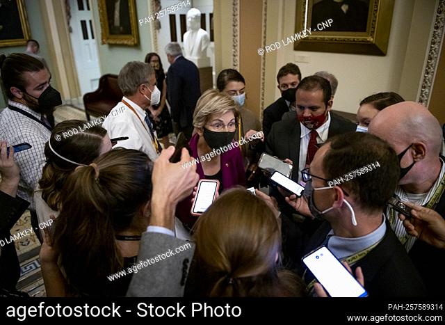 United States Senator Elizabeth Warren (Democrat of Massachusetts) stops to talk with reporters outside the Senate chamber at the US Capitol in Washington, DC