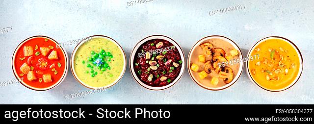 Vegan soup panorama with copy space. An assortment of vegetable cream soups