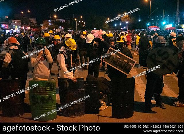 Members of the so-called front line hold shields in a New day of anti-government protests in Bogota, Colombia due to the national strike ""Paro Nacional""...